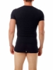 Underworks Men's Cotton Spandex Crew Neck T-Shirt in black,  worn as a base layer under a business shirt for a slim, undetectable fit.